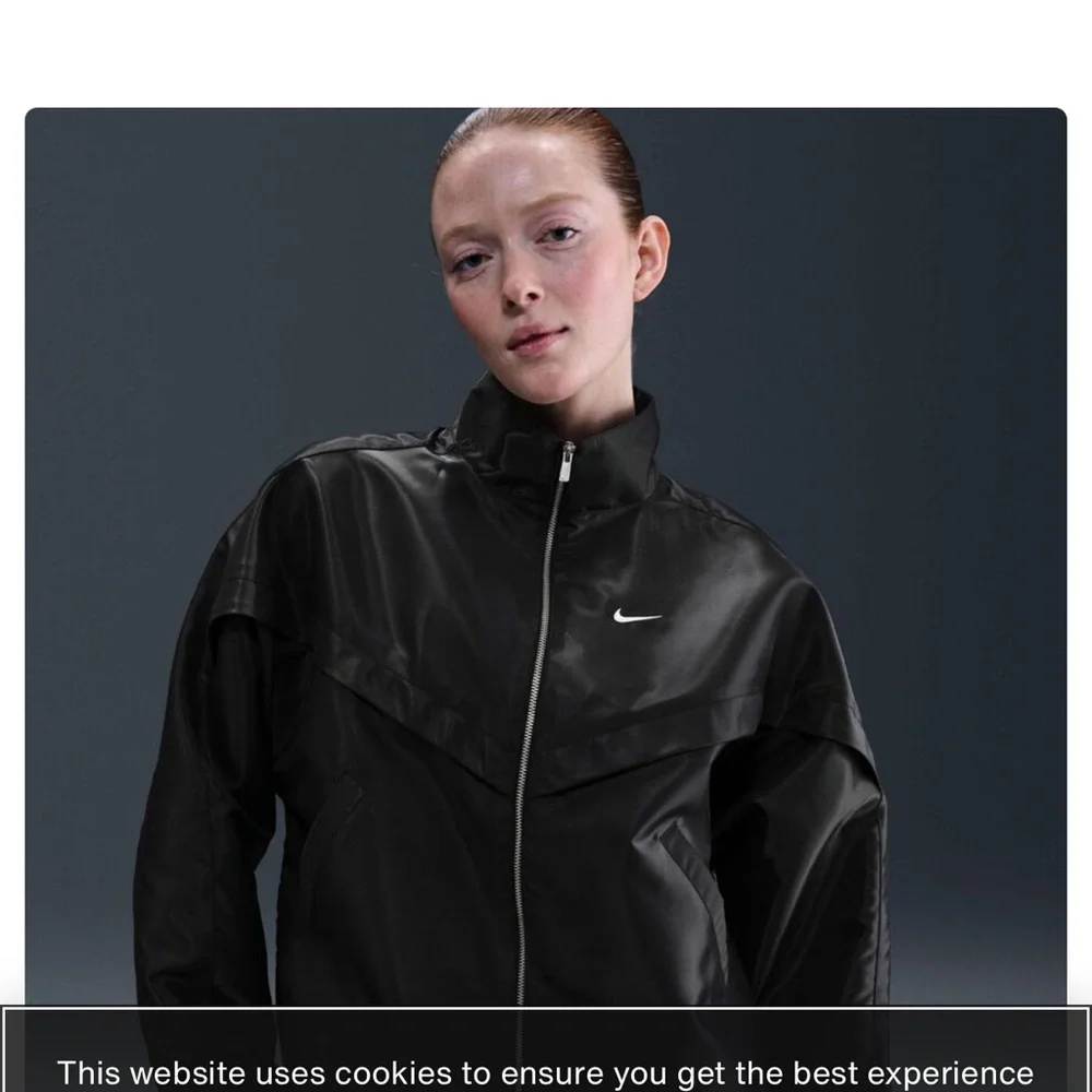Nike Women’s Black Zip-Front Lightweight Jacket w silver sheen